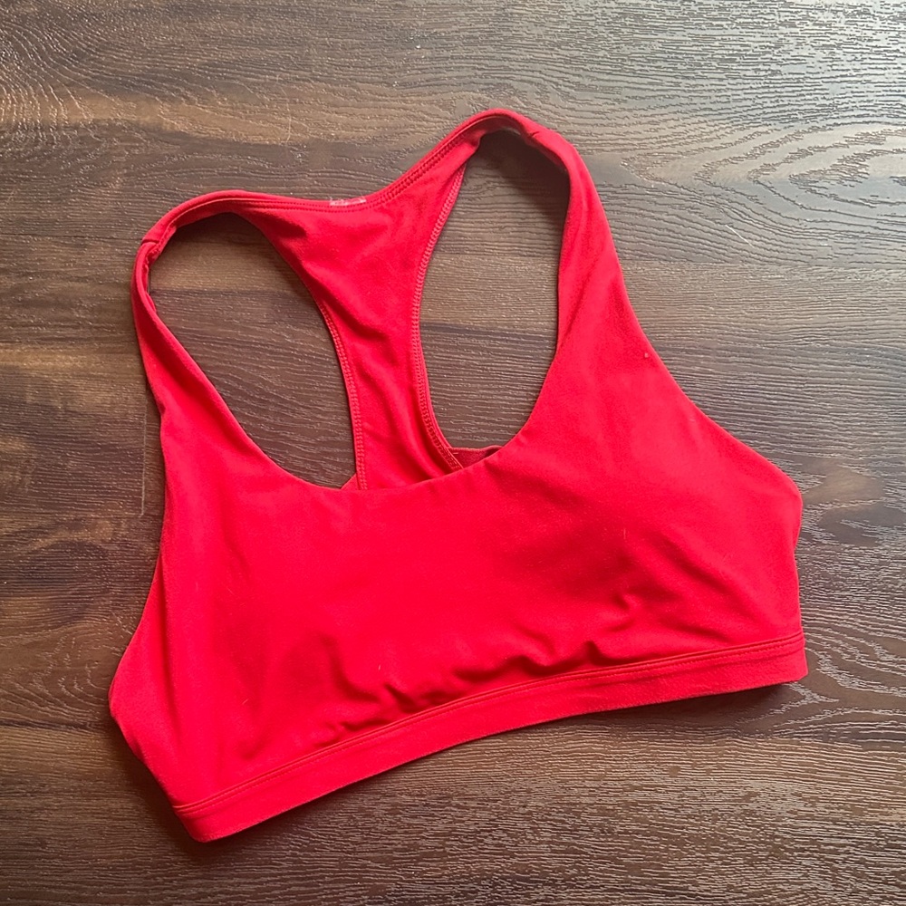 Red Fabletics sports bra with side cut out